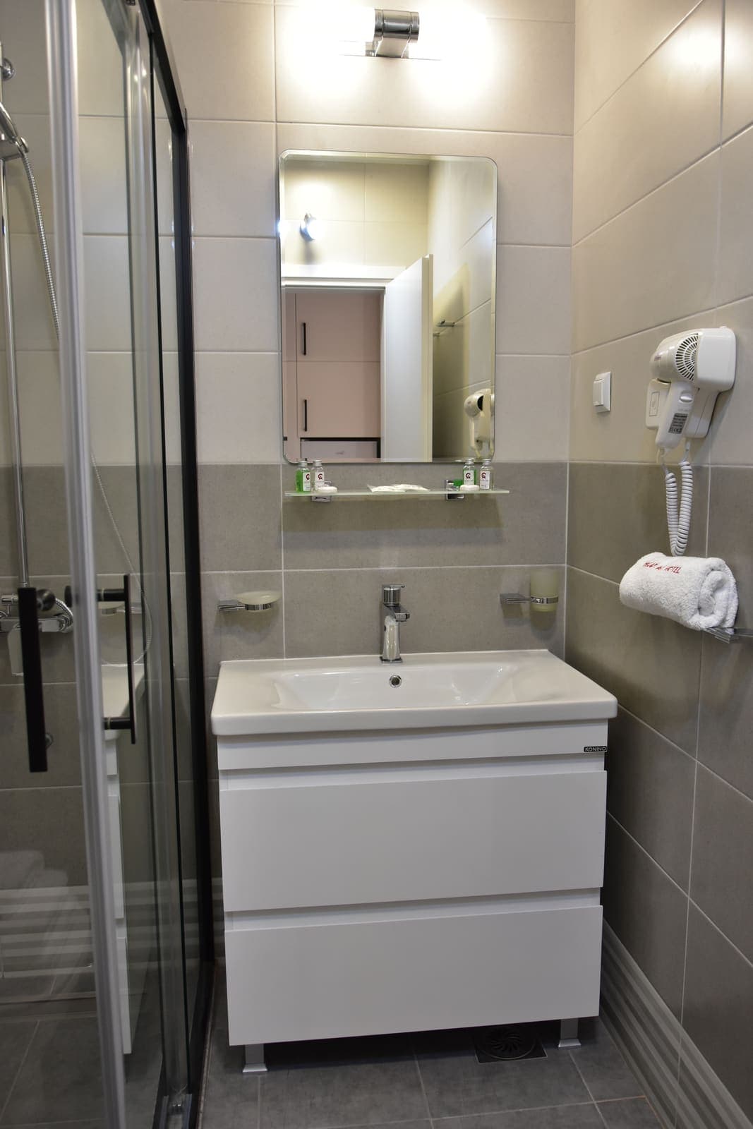 Glass-walled bathroom — Room 8