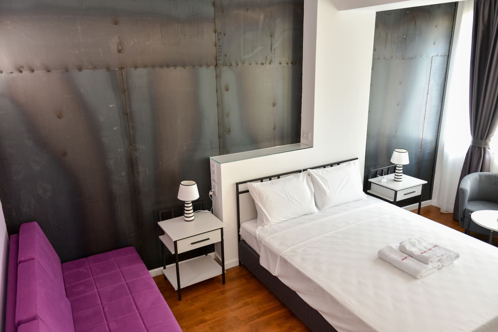 Double room with metal-panel art wall — Room 2